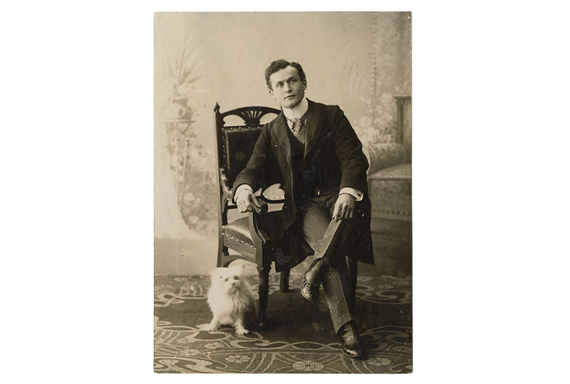 YOUTHFUL PORTRAIT OF HOUDINI AND HIS DOG, CHARLIE